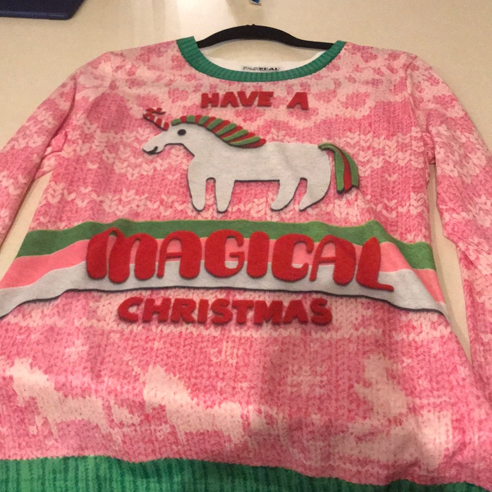 Never worn Christmas sweater style shirt